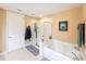 Bathroom with shower and soaking tub at 23619 Awabuki Dr, Venice, FL 34293