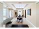 Bright dining room with hardwood floors and a large window at 23619 Awabuki Dr, Venice, FL 34293