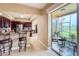 Kitchen with stainless steel appliances and breakfast bar at 23619 Awabuki Dr, Venice, FL 34293