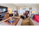 Living room with comfortable seating and large TV at 23619 Awabuki Dr, Venice, FL 34293