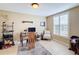 Home office with a desk, chair, and built-in shelving at 23619 Awabuki Dr, Venice, FL 34293
