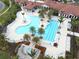 Resort-style pool with lap lanes, spacious deck, and lounge areas at 23619 Awabuki Dr, Venice, FL 34293