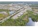 Aerial view of houses and landscape at 2751 Lavandula Ct, North Port, FL 34289