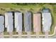 Five homes with tile roofs and attached garages at 2751 Lavandula Ct, North Port, FL 34289