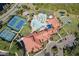 Resort-style pool, tennis courts, and clubhouse at 2751 Lavandula Ct, North Port, FL 34289