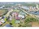 Community clubhouse with pools, tennis courts, and green spaces at 2751 Lavandula Ct, North Port, FL 34289
