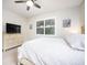 Comfortable bedroom with king-size bed and ample closet space at 2751 Lavandula Ct, North Port, FL 34289
