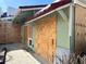 Home with red roof and boarded windows at 2985 N Beach Rd # C8-1, Englewood, FL 34223