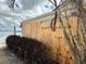 Boarded-up home with a water view and landscaping at 2985 N Beach Rd # C8-1, Englewood, FL 34223