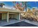 Needs renovation: Single-car carport with storage space at 2985 N Beach Rd # C8-1, Englewood, FL 34223