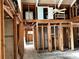 Under-construction interior with exposed framing at 2985 N Beach Rd # C8-1, Englewood, FL 34223