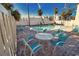 Relaxing pool area with patio furniture at 2985 N Beach Rd # C8-1, Englewood, FL 34223