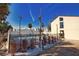Community pool with surrounding fence at 2985 N Beach Rd # C8-1, Englewood, FL 34223