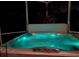 Hot tub with blue lighting in screened enclosure at 4004 Landor Ct, Venice, FL 34293