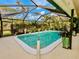 Screened pool and patio area, perfect for outdoor entertaining at 405 Park N Blvd, Venice, FL 34285