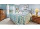 Spacious bedroom with a king-size bed and a dresser at 4206 Vicenza Dr # C24, Venice, FL 34293
