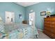 Bedroom with dresser and ensuite bathroom access at 4206 Vicenza Dr # C24, Venice, FL 34293