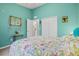 Bedroom with full bed and access to a bathroom at 4206 Vicenza Dr # C24, Venice, FL 34293
