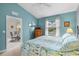 Bedroom with king-size bed, access to a dining area at 4206 Vicenza Dr # C24, Venice, FL 34293