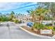 Community clubhouse with parking and landscaping at 4206 Vicenza Dr # C24, Venice, FL 34293