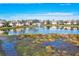 Community features a lake with fountain and well-maintained landscaping at 4206 Vicenza Dr # C24, Venice, FL 34293
