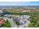 Aerial view of community amenities including pool, tennis courts at 4206 Vicenza Dr # C24, Venice, FL 34293