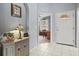 Bright entryway with tiled floors and view of office at 4206 Vicenza Dr # C24, Venice, FL 34293