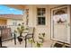 Relaxing front patio with seating and tropical plants at 4206 Vicenza Dr # C24, Venice, FL 34293