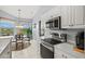 Well-equipped kitchen with stainless steel appliances and ample cabinet space at 4206 Vicenza Dr # C24, Venice, FL 34293