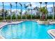 Inviting community pool with spa and seating at 4206 Vicenza Dr # C24, Venice, FL 34293