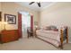 Charming bedroom with daybed and decorative window treatments at 447 Pinewood Lake Dr, Venice, FL 34285