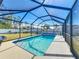 Relaxing screened pool with open backyard views at 4611 Crabapple Ave, North Port, FL 34287