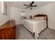 Spacious bedroom with carpeted floor and ceiling fan at 4743 Butterfly Ln, North Port, FL 34288