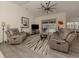 Spacious living room featuring a neutral color palette and comfortable seating at 4743 Butterfly Ln, North Port, FL 34288
