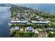 Aerial view of waterfront homes and lush landscaping at 5055 N Beach Rd # 201, Englewood, FL 34223