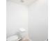 Small bathroom with toilet and white walls at 5055 N Beach Rd # 201, Englewood, FL 34223