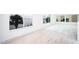 Spacious living area with water views and new flooring at 5055 N Beach Rd # 201, Englewood, FL 34223