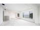 Bright living room with water views and large windows at 5055 N Beach Rd # 201, Englewood, FL 34223