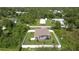 Aerial view of house, backyard, and surrounding neighborhood at 5552 Guest Ter, Port Charlotte, FL 33981