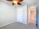 Spacious bedroom with ceiling fan and ample closet space at 5552 Guest Ter, Port Charlotte, FL 33981