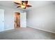 Spacious bedroom with ceiling fan and private bathroom at 5552 Guest Ter, Port Charlotte, FL 33981