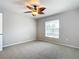 Bedroom with ceiling fan and window with blinds at 5552 Guest Ter, Port Charlotte, FL 33981