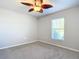 Bright bedroom with ceiling fan and window at 5552 Guest Ter, Port Charlotte, FL 33981