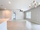 Bright living room with tile floors and a ceiling fan at 5552 Guest Ter, Port Charlotte, FL 33981