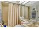 Clean bathroom with shower/tub combo and updated vanity at 560 Fallbrook Dr, Venice, FL 34292