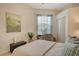 Charming bedroom with built-in desk and ample closet space at 560 Fallbrook Dr, Venice, FL 34292