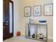 Console table with decorative objects in an entryway at 629 Maraviya Blvd, Nokomis, FL 34275