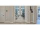 Hallway with French doors leading to an office at 629 Maraviya Blvd, Nokomis, FL 34275