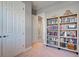 Light and bright hallway with neutral paint and carpet at 629 Maraviya Blvd, Nokomis, FL 34275