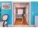 View into bedroom with twin beds and tropical bedding at 660 Silk Oak Dr, Venice, FL 34293